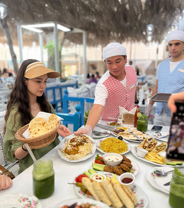 Arabian Tea House bougainvillea courtyard in Al Fahidi with traditional Emirati breakfast — photo 2
