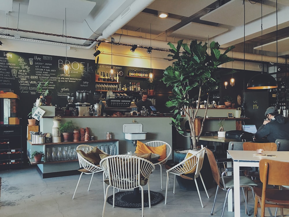 Orto Cafe garden-inspired interior with greenery and healthy brunch plates — photo 1