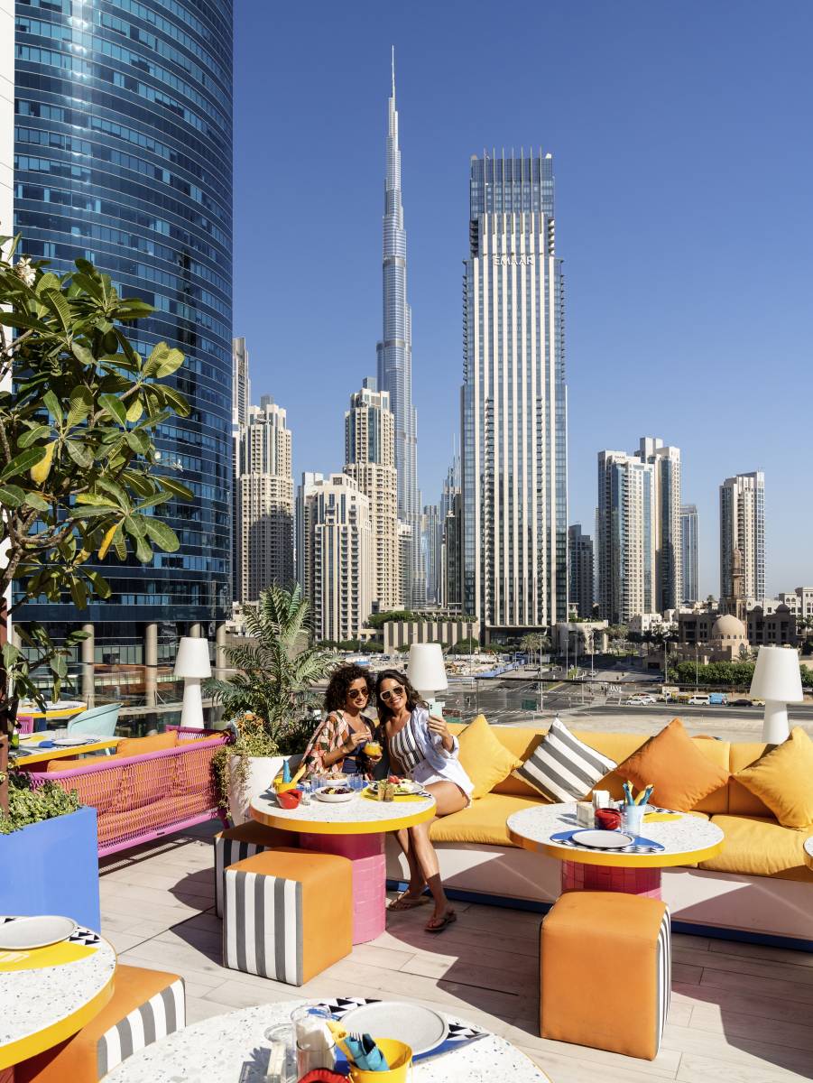 Pullman Dubai Downtown hotel exterior with Burj Khalifa in the background — photo 1
