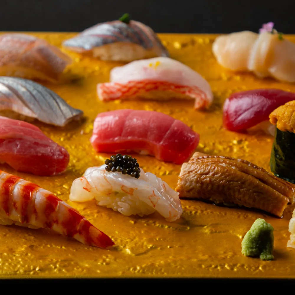 TakaHisa beautifully arranged nigiri sushi on a minimalist counter — photo 2