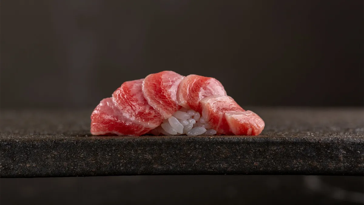 TakaHisa beautifully arranged nigiri sushi on a minimalist counter